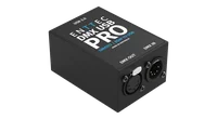 以四分之三视角拍摄的 DMX USB Pro，顶盖印有 USB 2.0、ENTTEC DMX USB PRO、DMX512 / RDM TO USB 和 MADE IN AUSTRALIA，端面板上有一个带银色 PUSH 卡扣的 DMX OUT XLR 母头和一个 DMX IN XLR 公头。